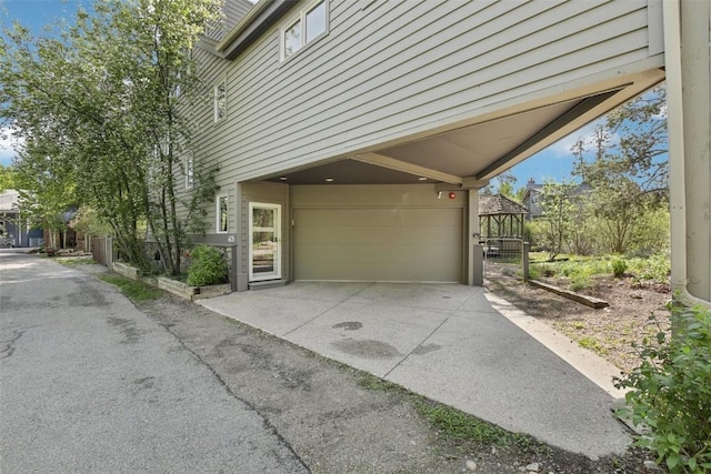 405 Creekside Dr, Frisco, CO 80443 - view of property exterior featuring driveway and a carport
