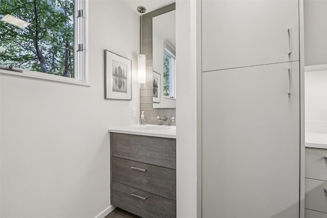 405 Creekside Dr, Frisco, CO 80443 - bathroom with vanity and decorative backsplash