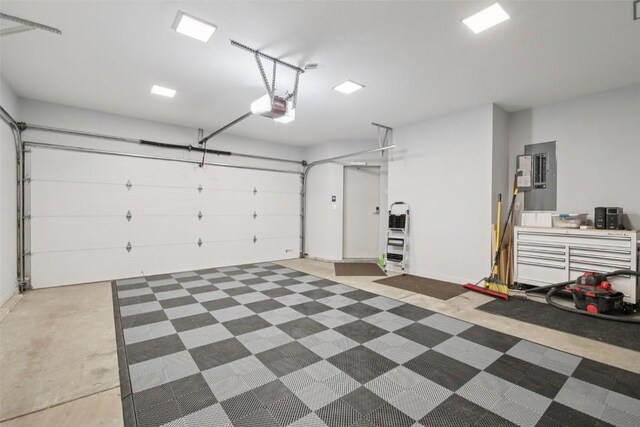 405 Creekside Dr, Frisco, CO 80443 - garage featuring a garage door opener and electric panel
