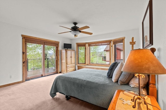 1088 Longview Cir Unit 1, Steamboat Springs, CO 80487 - carpeted bedroom with access to exterior and a ceiling fan