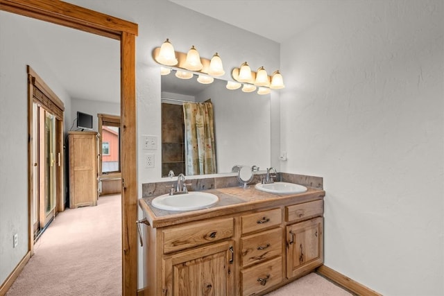 1088 Longview Cir Unit 1, Steamboat Springs, CO 80487 - bathroom featuring double vanity and a shower with shower curtain