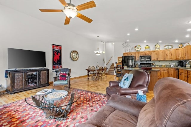 1088 Longview Cir Unit 1, Steamboat Springs, CO 80487 - living room with a chandelier, a ceiling fan, light wood-type flooring, and recessed lighting