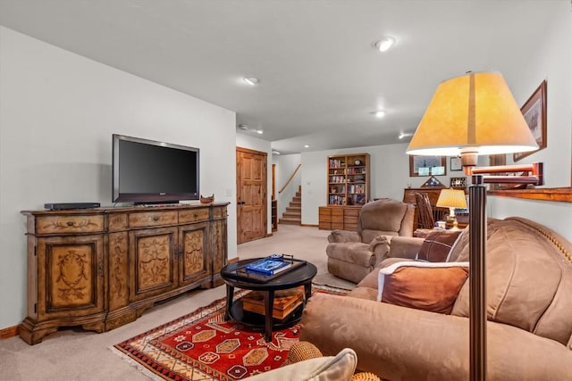 1088 Longview Cir Unit 1, Steamboat Springs, CO 80487 - living area with light colored carpet, stairs, and recessed lighting