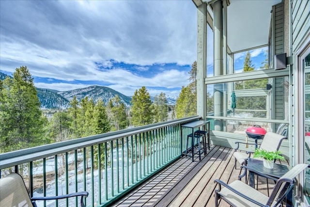 balcony featuring a mountain view