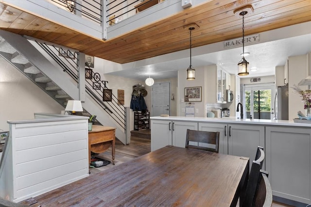 2146 Aster Pl Unit 3, Steamboat Springs, CO 80487 - dining area featuring wood finished floors, stairway, and wooden ceiling