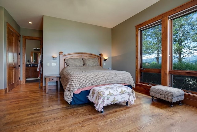 35525 Humble Rd, Steamboat Springs, CO 80487 - bedroom featuring wood finished floors and recessed lighting