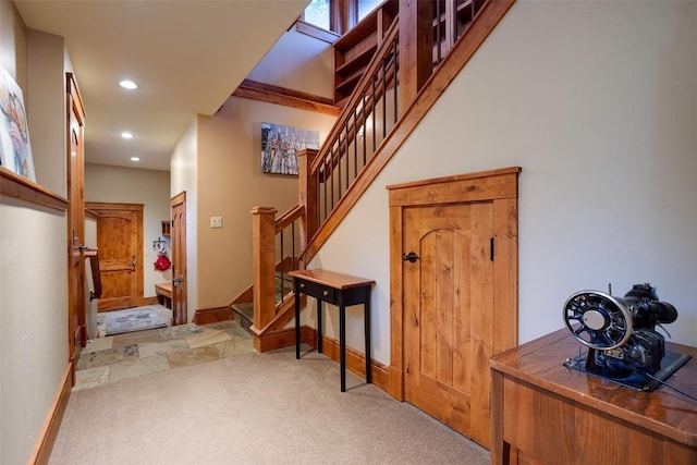 35525 Humble Rd, Steamboat Springs, CO 80487 - foyer featuring recessed lighting, stairway, and carpet flooring