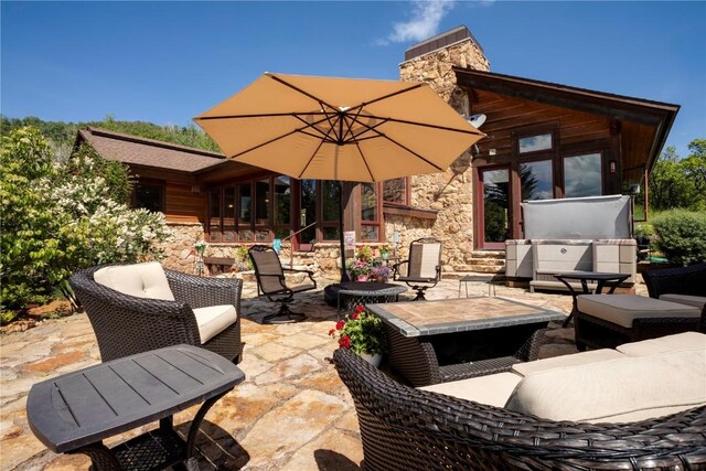 35525 Humble Rd, Steamboat Springs, CO 80487 - view of patio / terrace featuring an outdoor hangout area