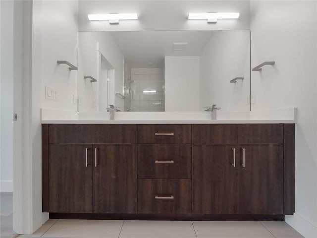 740 Blue River Pkwy Unit A22, Silverthorne, CO 80498 - full bathroom with double vanity, tiled shower, and tile patterned flooring
