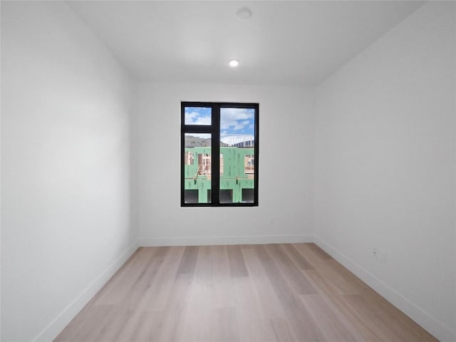 740 Blue River Pkwy Unit A22, Silverthorne, CO 80498 - unfurnished room featuring light wood-type flooring and baseboards