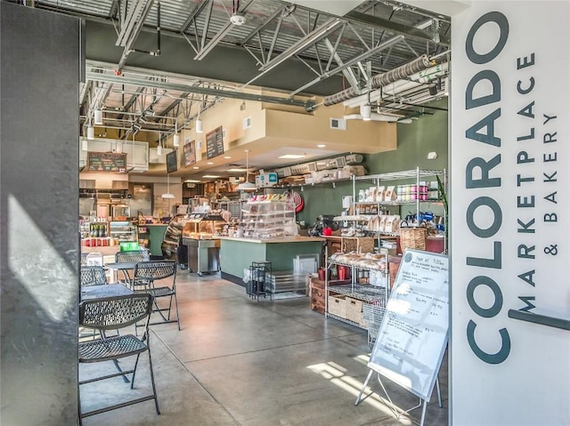 740 Blue River Pkwy Unit A22, Silverthorne, CO 80498 - misc room with concrete flooring and a towering ceiling