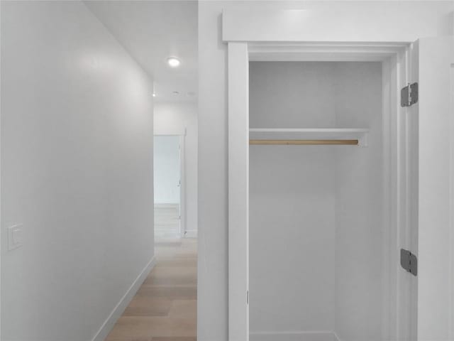 740 Blue River Pkwy Unit A22, Silverthorne, CO 80498 - corridor with baseboards, wood finished floors, and recessed lighting