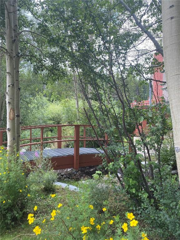 601 Village Rd # 501, Breckenridge, CO 80424 - view of yard featuring a deck