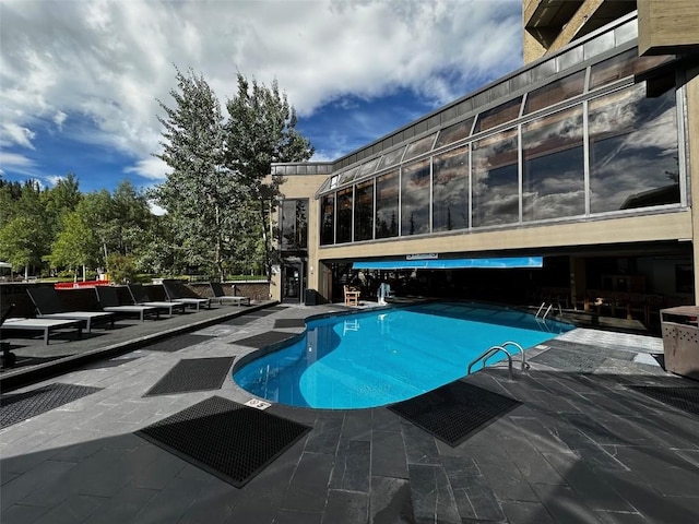 601 Village Rd # 501, Breckenridge, CO 80424 - view of swimming pool featuring a patio
