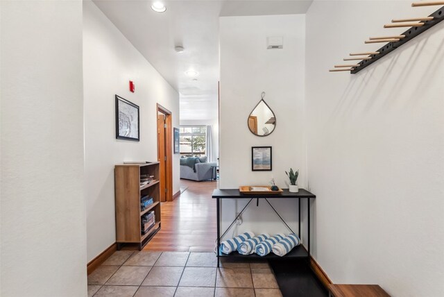 850 Blue River Pkwy Unit E5, Silverthorne, CO 80498 - hallway with recessed lighting, baseboards, and light tile patterned floors