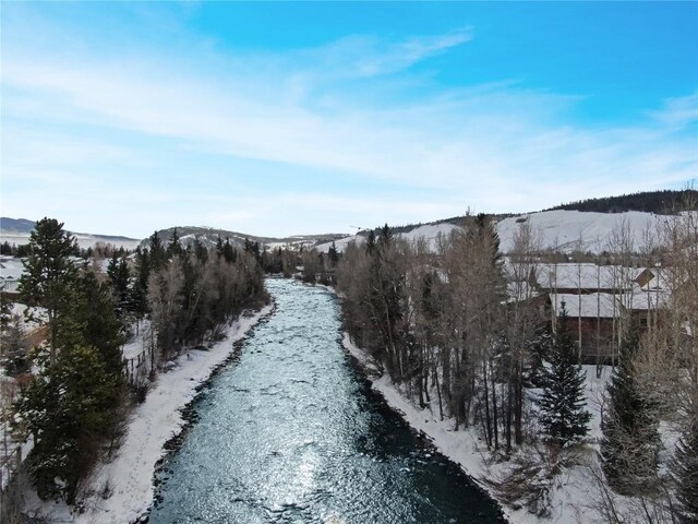 850 Blue River Pkwy Unit E5, Silverthorne, CO 80498 - drone / aerial view featuring a mountain view