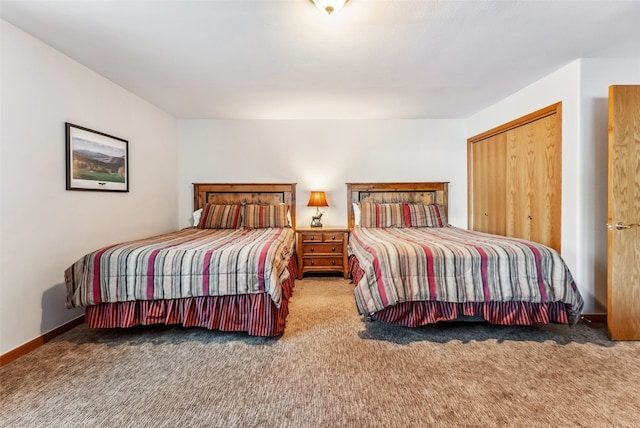 carpeted bedroom with a closet