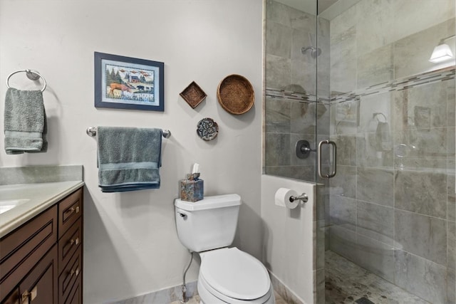 1675 Ranch Rd Unit 410, Steamboat Springs, CO 80487 - full bath featuring toilet, a stall shower, vanity, and baseboards