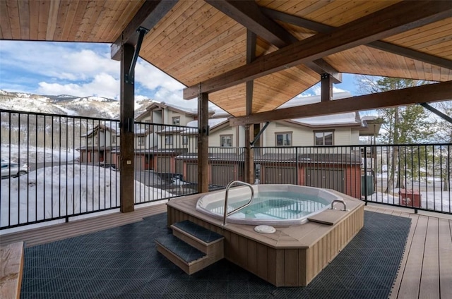 1675 Ranch Rd Unit 410, Steamboat Springs, CO 80487 - wooden deck with an outdoor hot tub and a mountain view