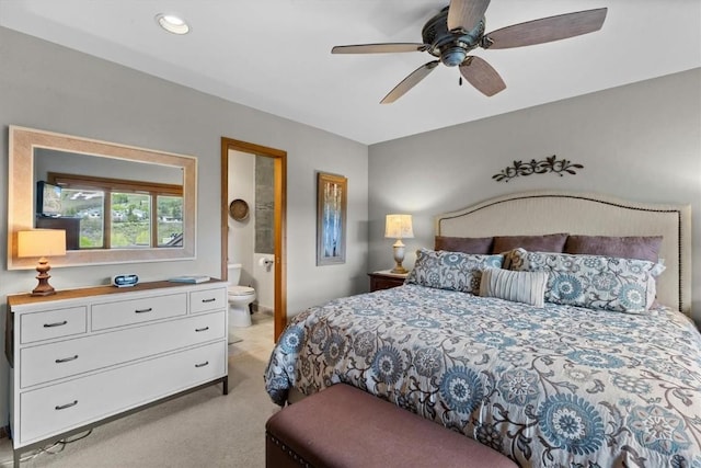 1675 Ranch Rd Unit 410, Steamboat Springs, CO 80487 - bedroom with light carpet, ensuite bath, ceiling fan, recessed lighting, and baseboards