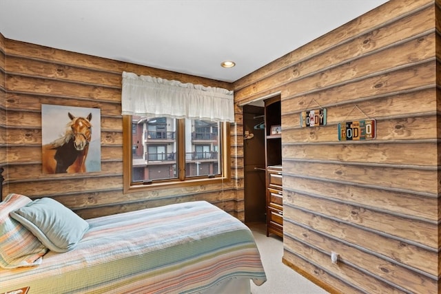 1675 Ranch Rd Unit 410, Steamboat Springs, CO 80487 - carpeted bedroom with wood walls