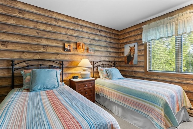 1675 Ranch Rd Unit 410, Steamboat Springs, CO 80487 - bedroom with rustic walls and carpet flooring