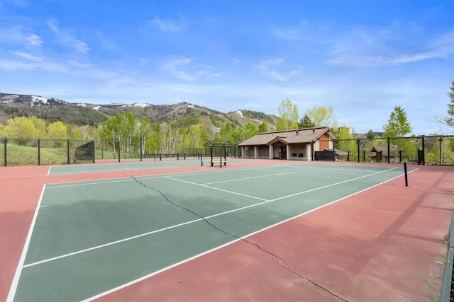 1675 Ranch Rd Unit 410, Steamboat Springs, CO 80487 - view of tennis court with a mountain view and community basketball court