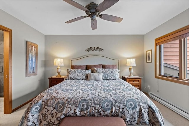 1675 Ranch Rd Unit 410, Steamboat Springs, CO 80487 - carpeted bedroom with a baseboard radiator, a ceiling fan, and baseboards