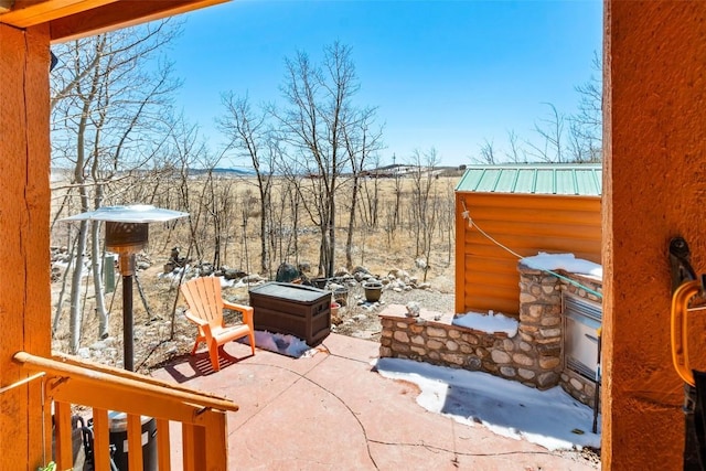 view of snow covered patio