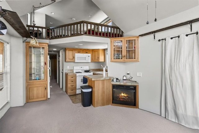 kitchen with white appliances, glass insert cabinets, light carpet, light countertops, and a peninsula
