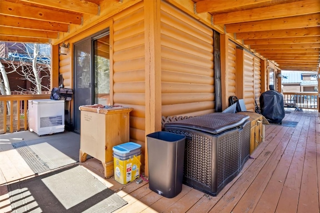 wooden deck featuring area for grilling
