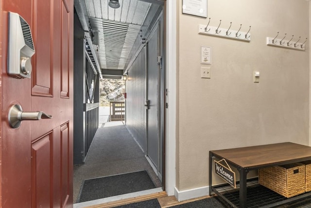 2626 Longthong Rd Unit 203, Steamboat Springs, CO 80487 - corridor with carpet and baseboards