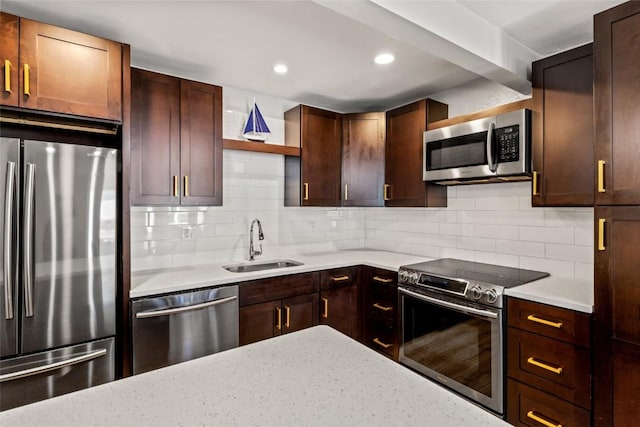 13 Cedar Ct Unit 13, Steamboat Springs, CO 80487 - kitchen featuring appliances with stainless steel finishes, backsplash, recessed lighting, open shelves, and dark brown cabinets