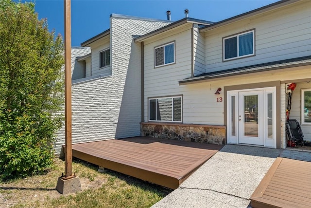 13 Cedar Ct Unit 13, Steamboat Springs, CO 80487 - back of property featuring a deck and stone siding