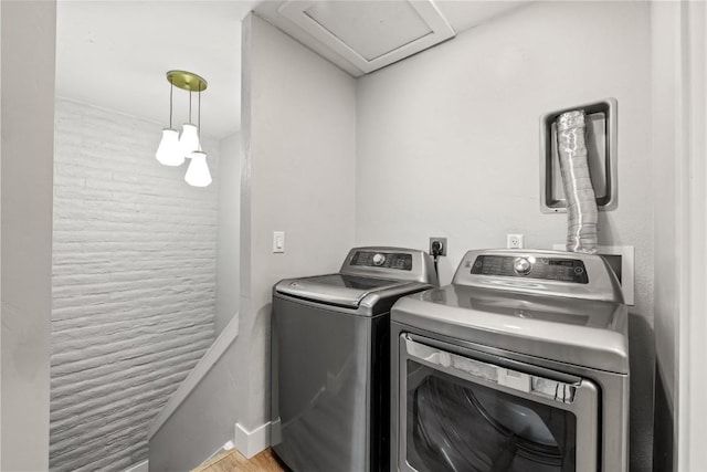 13 Cedar Ct Unit 13, Steamboat Springs, CO 80487 - washroom featuring washing machine and clothes dryer and attic access