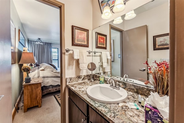 ensuite bathroom featuring vanity and ensuite bathroom
