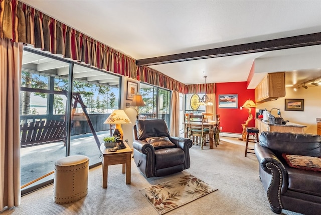 carpeted living room featuring a baseboard radiator, baseboards, and beamed ceiling