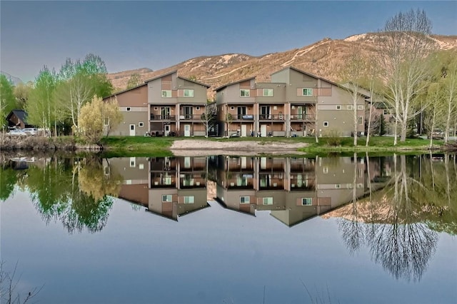 835 Weiss Cir Unit 2, Steamboat Springs, CO 80487 - rear view of house with a water and mountain view