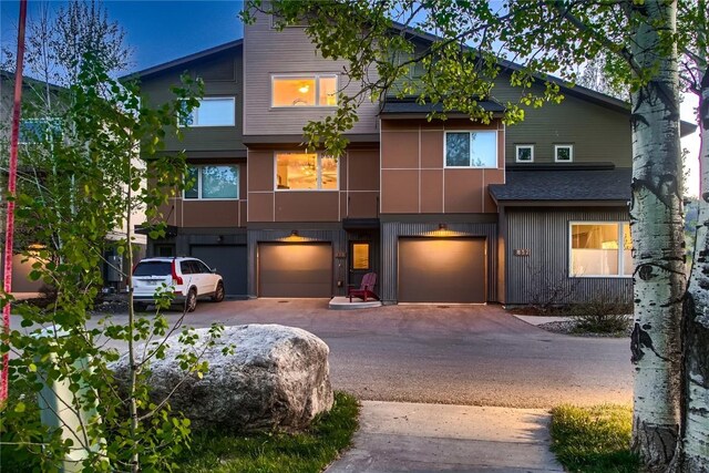 835 Weiss Cir Unit 2, Steamboat Springs, CO 80487 - view of front of home featuring driveway and a garage