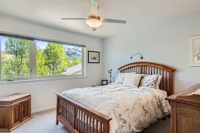 835 Weiss Cir Unit 2, Steamboat Springs, CO 80487 - bedroom featuring light colored carpet, baseboards, and ceiling fan