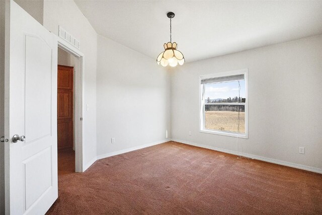 306 Shoshone Dr, Como, CO 80456 - carpeted spare room with visible vents, baseboards, and a notable chandelier