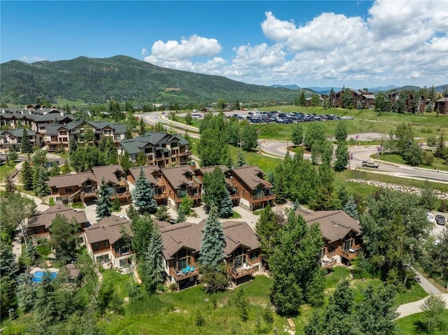 drone / aerial view with a residential view and a mountain view