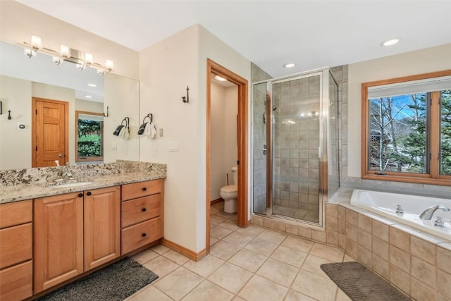 full bath featuring vanity, toilet, a bath, tile patterned floors, and a shower stall
