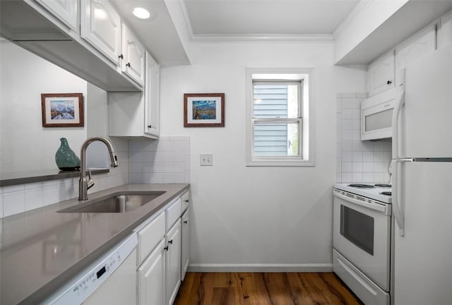3100 Chinook Ln Unit 6, Steamboat Springs, CO 80487 - kitchen with white appliances, a sink, backsplash, white cabinetry, and ornamental molding