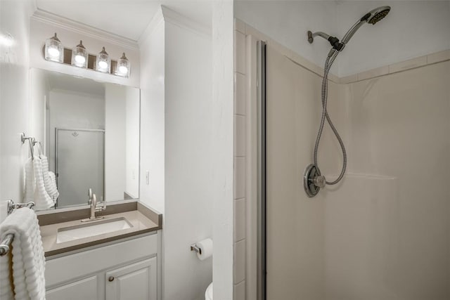 3100 Chinook Ln Unit 6, Steamboat Springs, CO 80487 - full bathroom featuring a shower stall, vanity, crown molding, and toilet