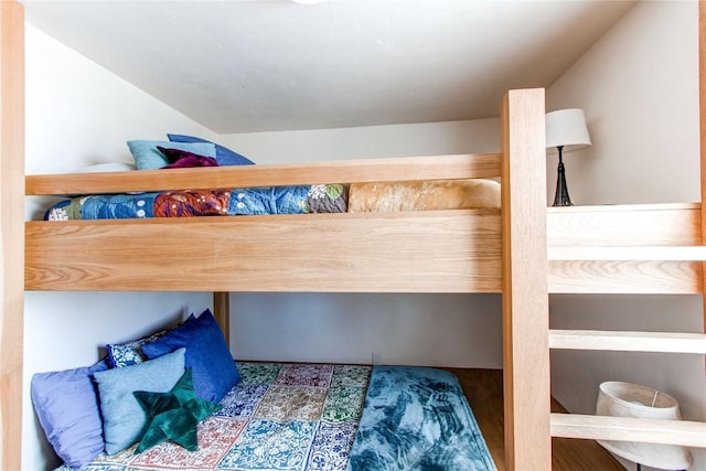 bedroom featuring vaulted ceiling