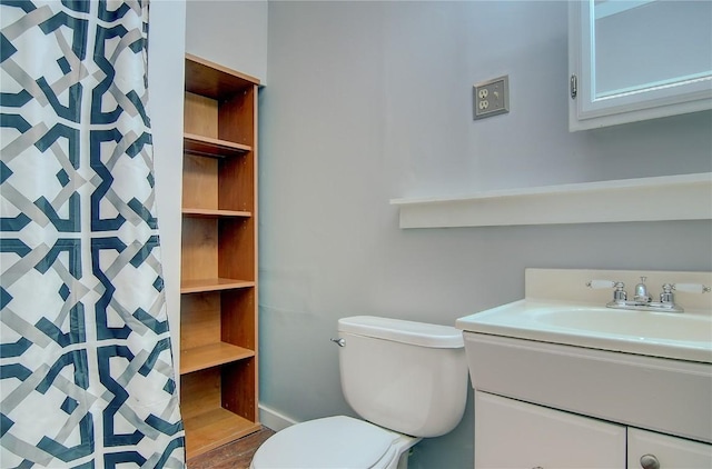 350 Old Fish Creek Falls Rd Unit 350, Steamboat Springs, CO 80487 - bathroom featuring vanity, toilet, a shower with curtain, and wood finished floors
