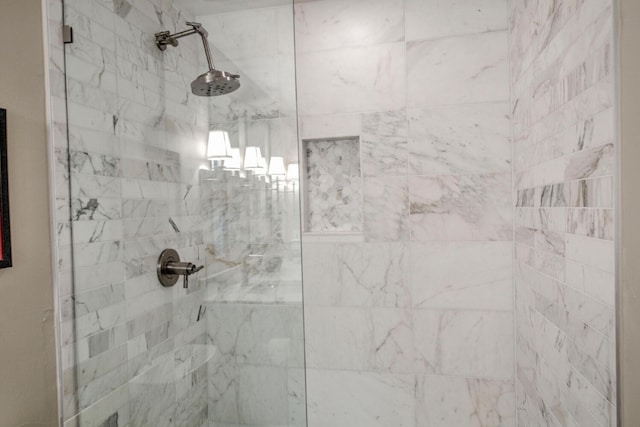 bathroom featuring a shower stall