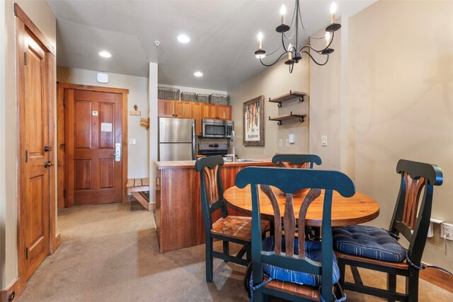 20 Hunki Dori Ct Unit 2215, Keystone, CO 80435 - dining area featuring recessed lighting, light colored carpet, and a notable chandelier
