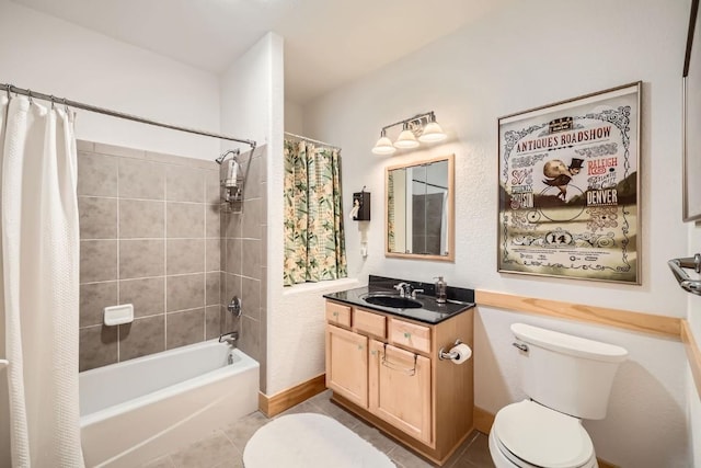 full bathroom with tile patterned floors, shower / bath combination with curtain, vanity, and toilet